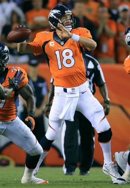 Quarterback making decisive plays under pressure