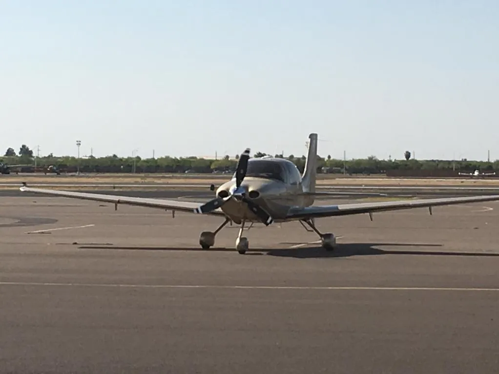 View from a small airplane cockpit during flight